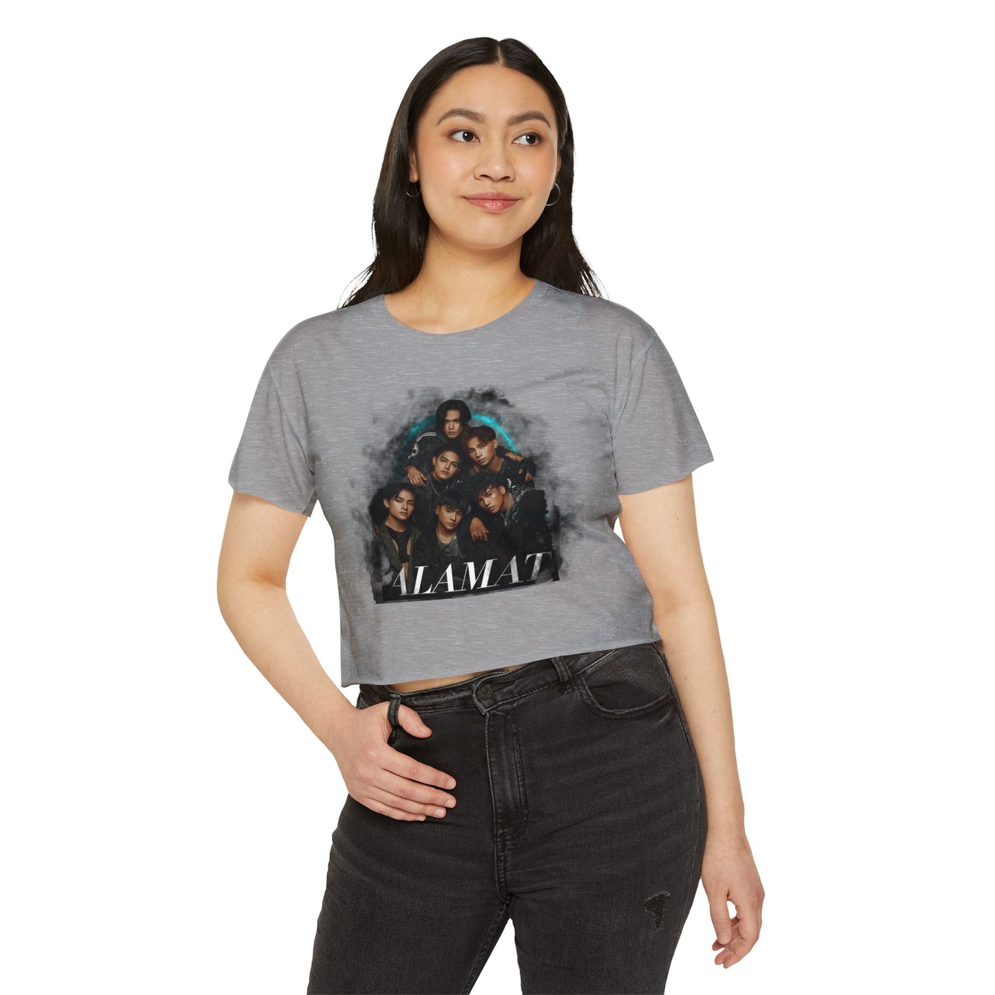 Young woman wearing a P-Pop Alamat crop top featuring a graphic design, perfect for concerts and casual gatherings.