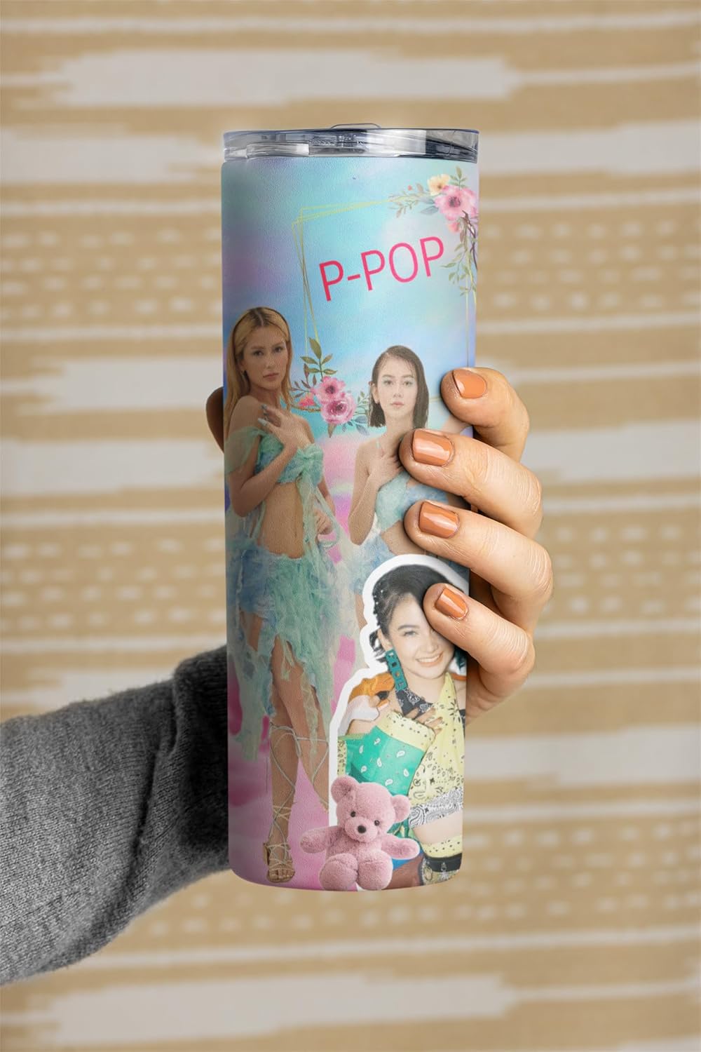 P-Pop G22 20 oz tumbler held in hand, featuring vibrant designs celebrating Filipino pop culture.